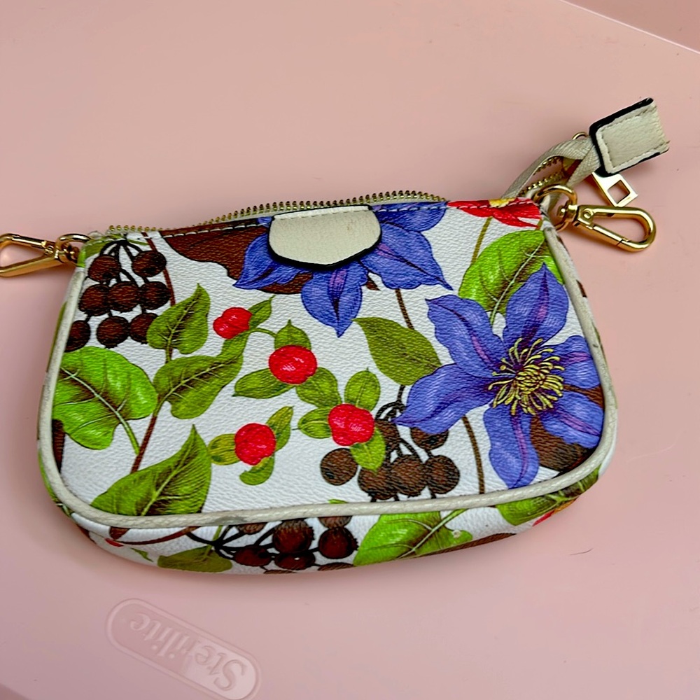 A faux leather makeup bag